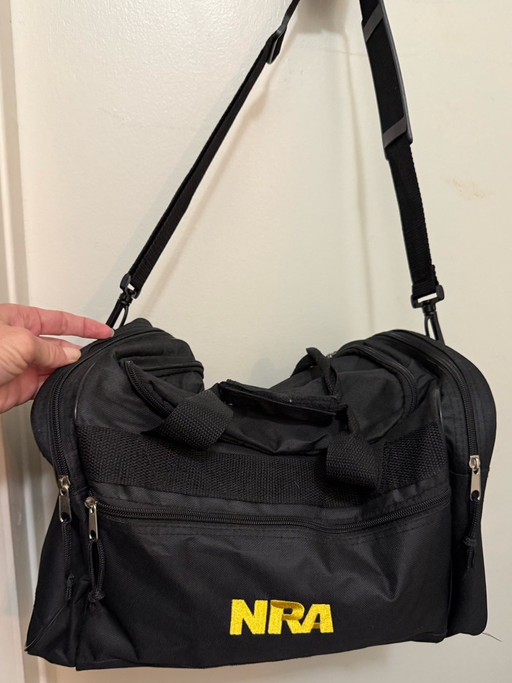 NRA Black Duffel Bag with Adjustable Shoulder Strap and Cotton Patches